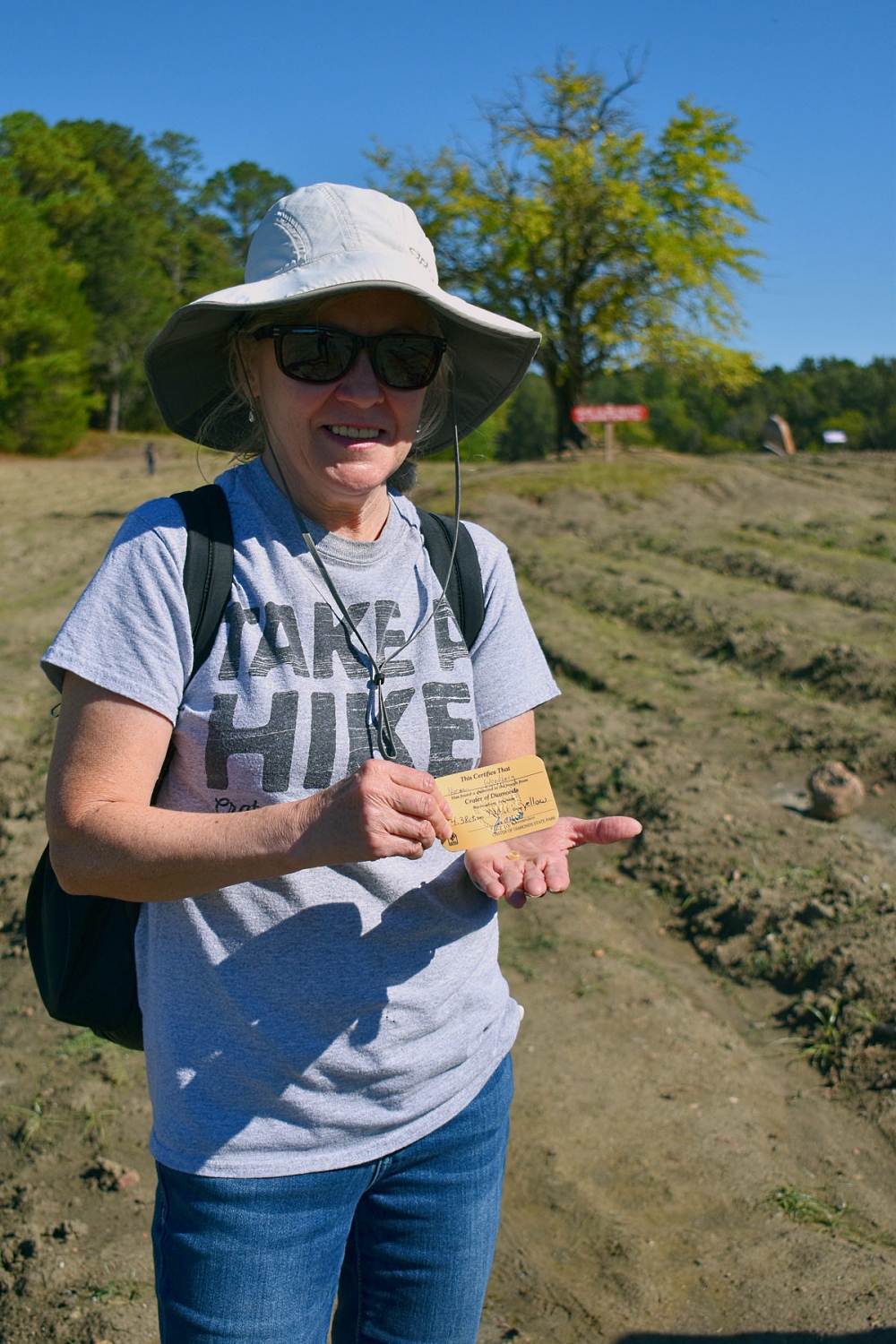 Noreen Wredberg holding her diamond and certificate