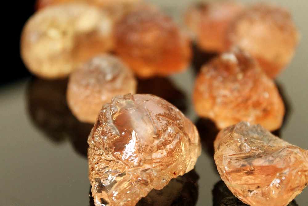 Gum Arabic chunks on black background