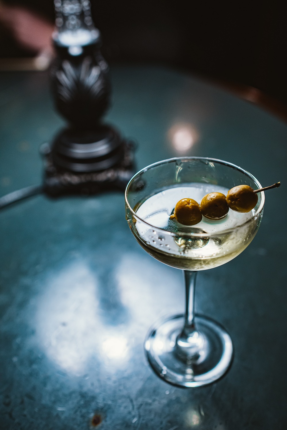 martini with 3 olives