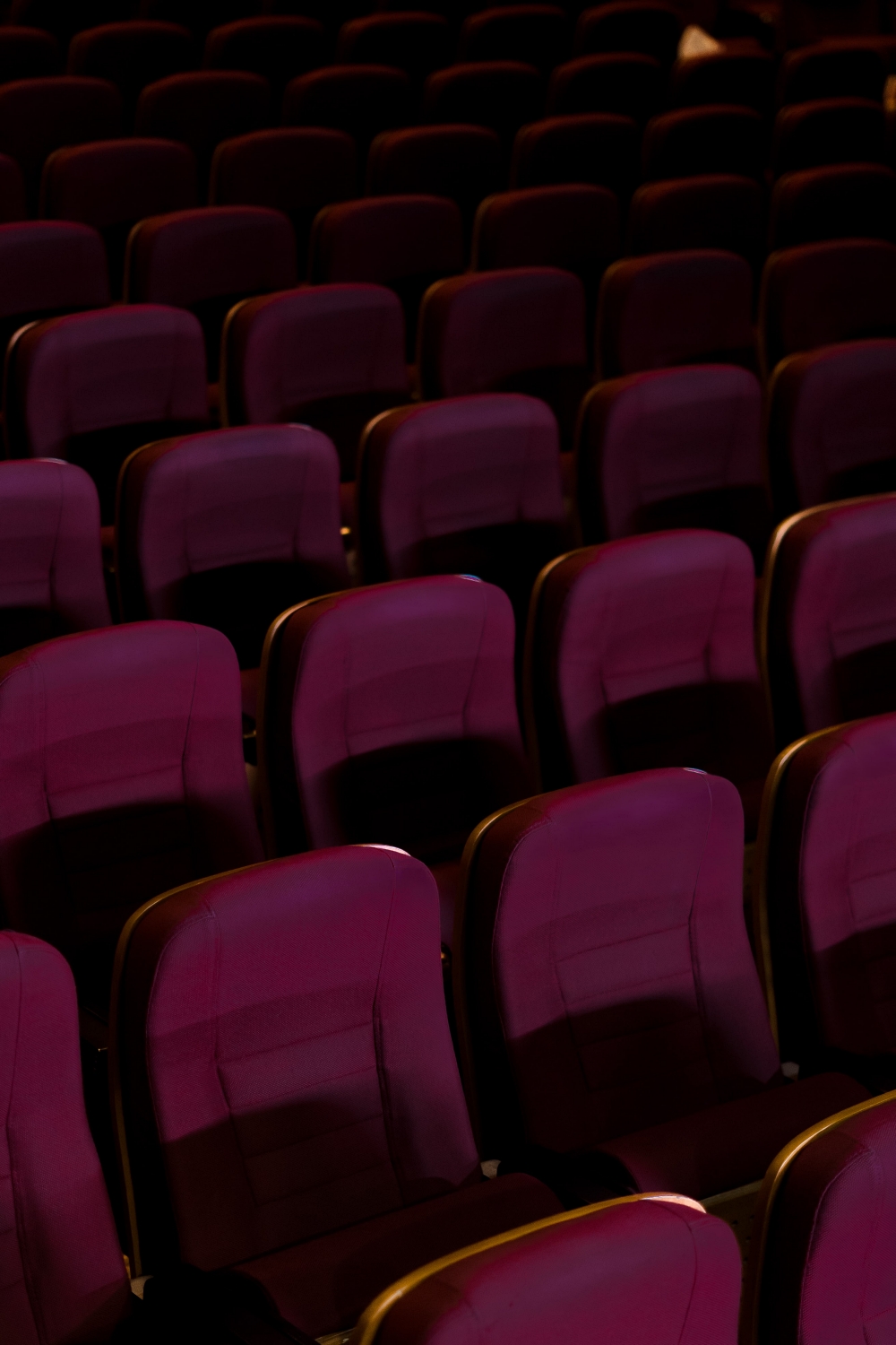 movie theater seats in the dark