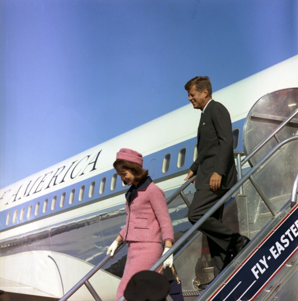 JFK and Jackie descending stairs of Air Force One for the last time together