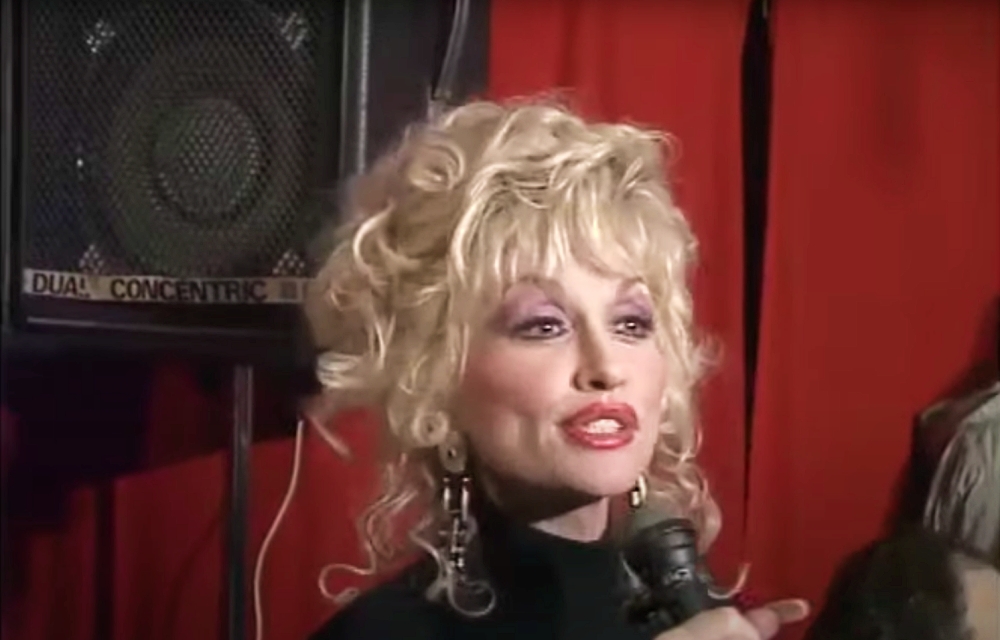 Dolly Parton performing at an Irish pub