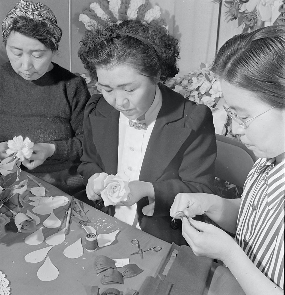 internees making faux flowers at a WWII Japanese internment camp