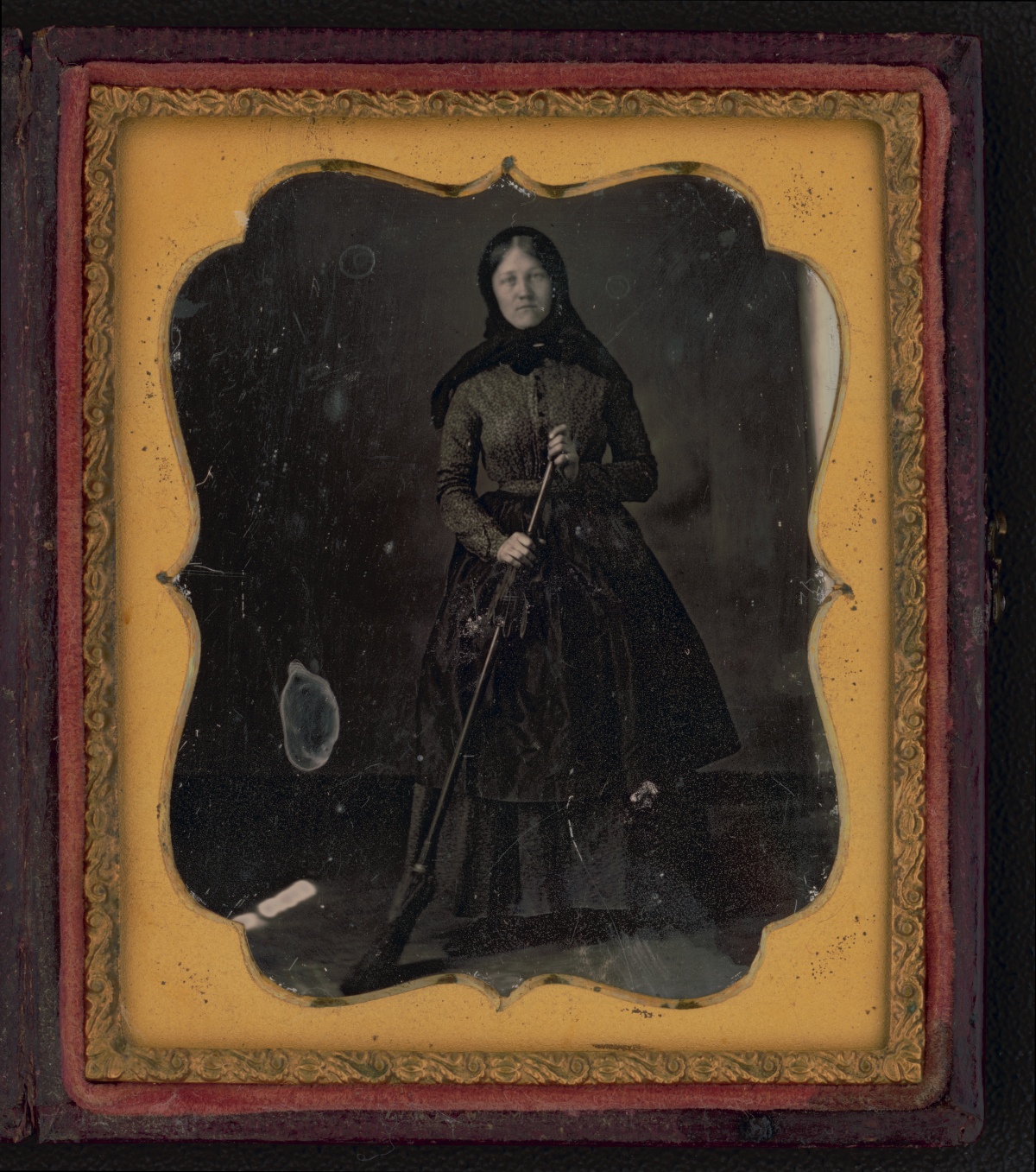19th century cleaning woman with a broom