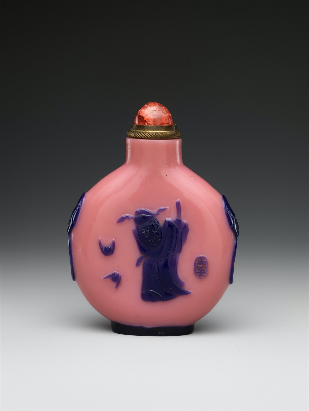 19th century glass snuff bottle depicting Zhong Kui, vanquisher of evil spirits in Chinese mythology