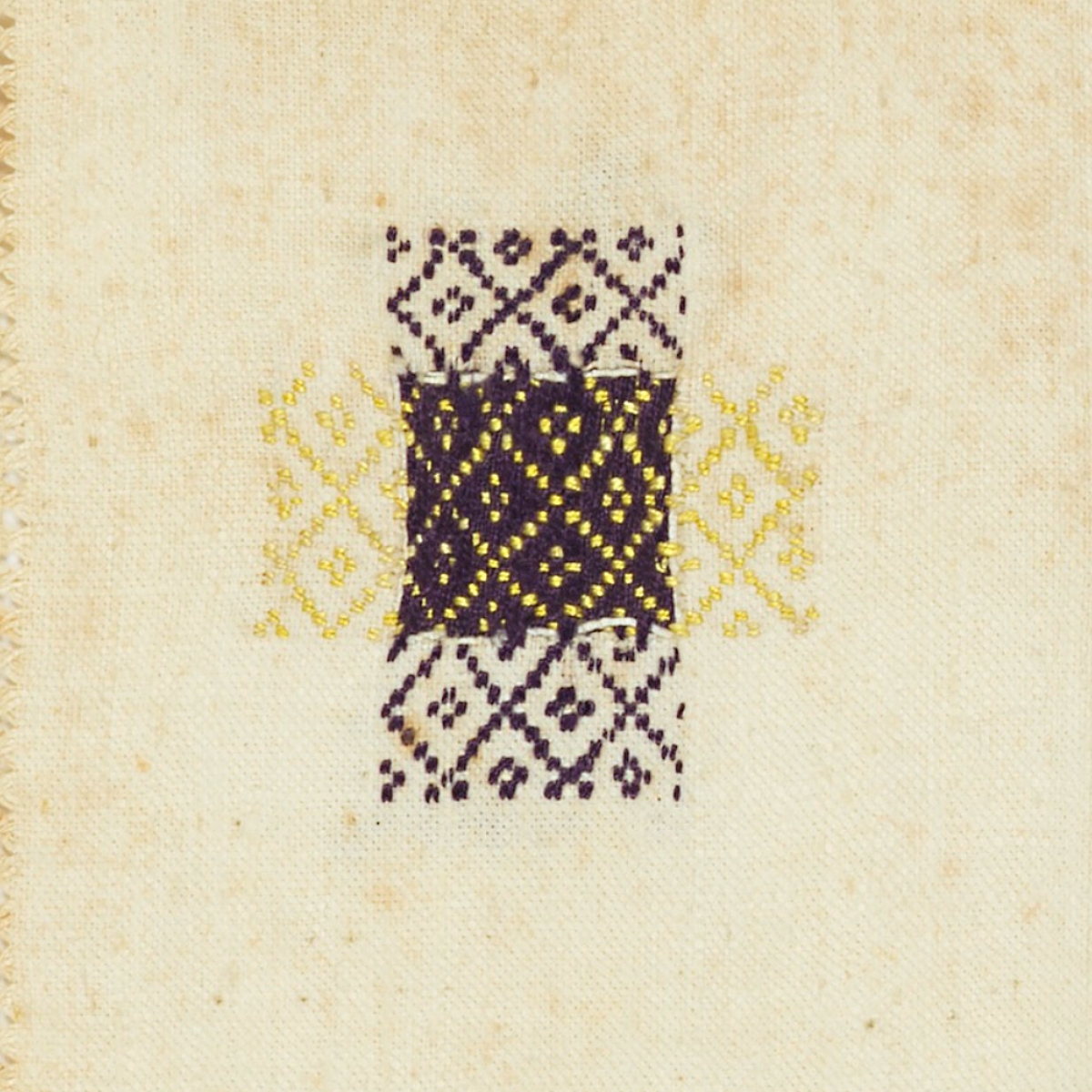 detail of an 1836 darning sampler