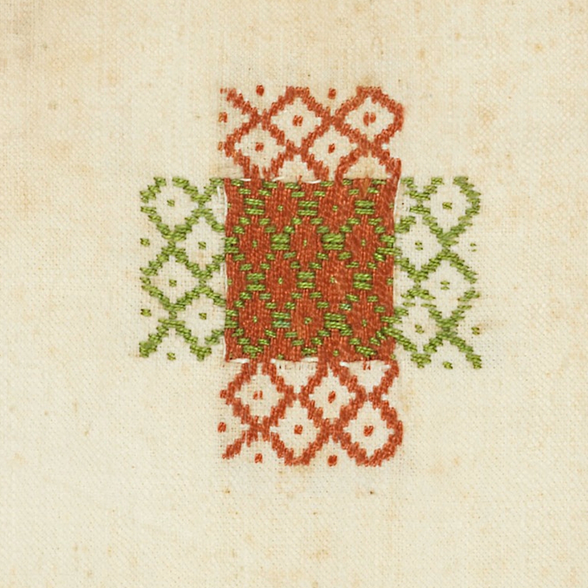 detail of an 1836 darning sampler