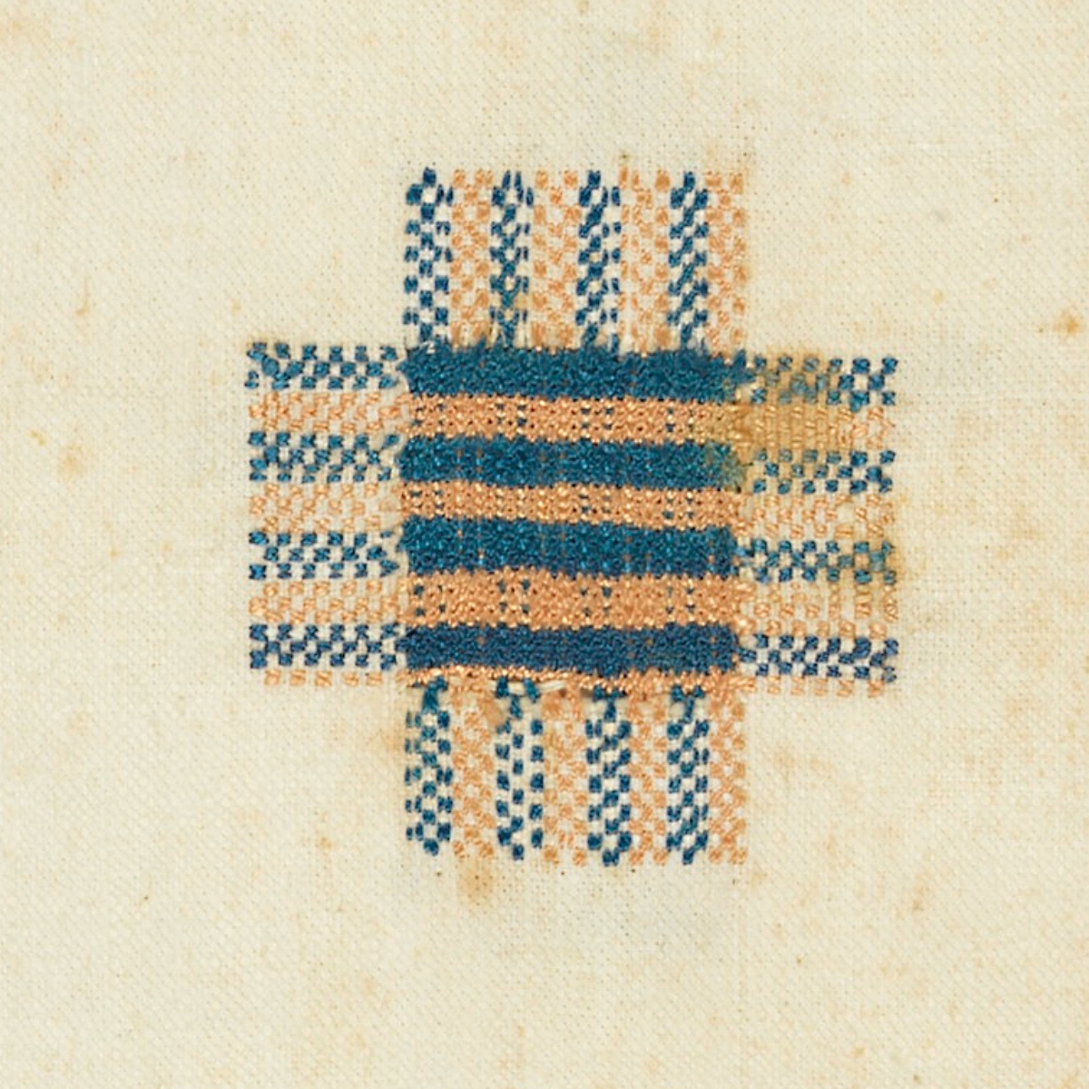 detail of an 1836 darning sampler