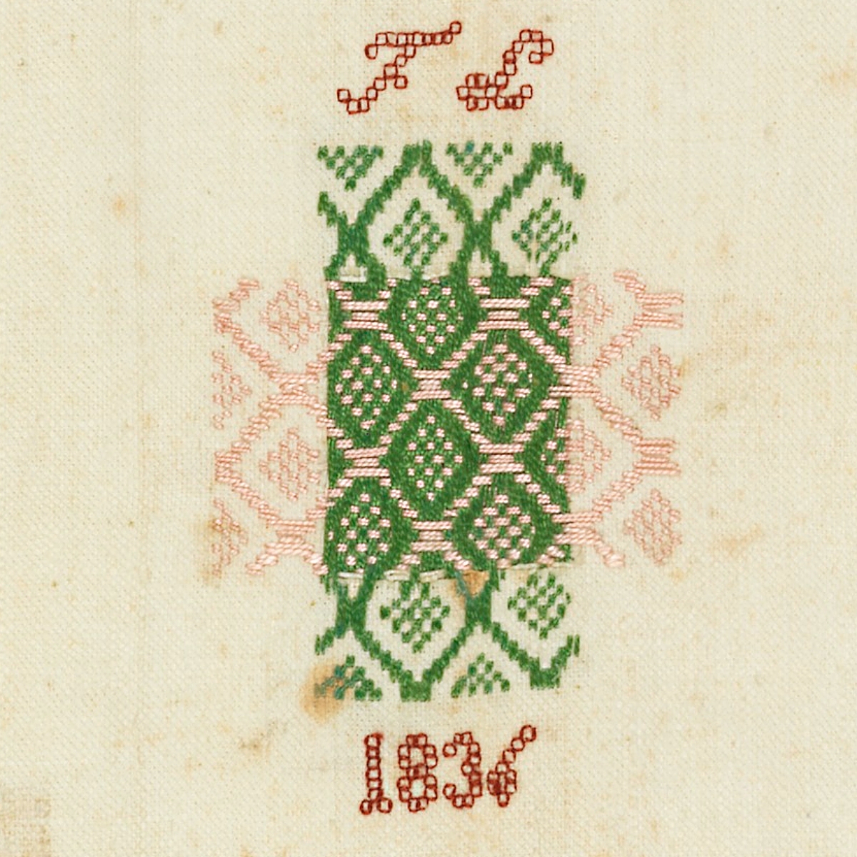 detail of an 1836 darning sampler
