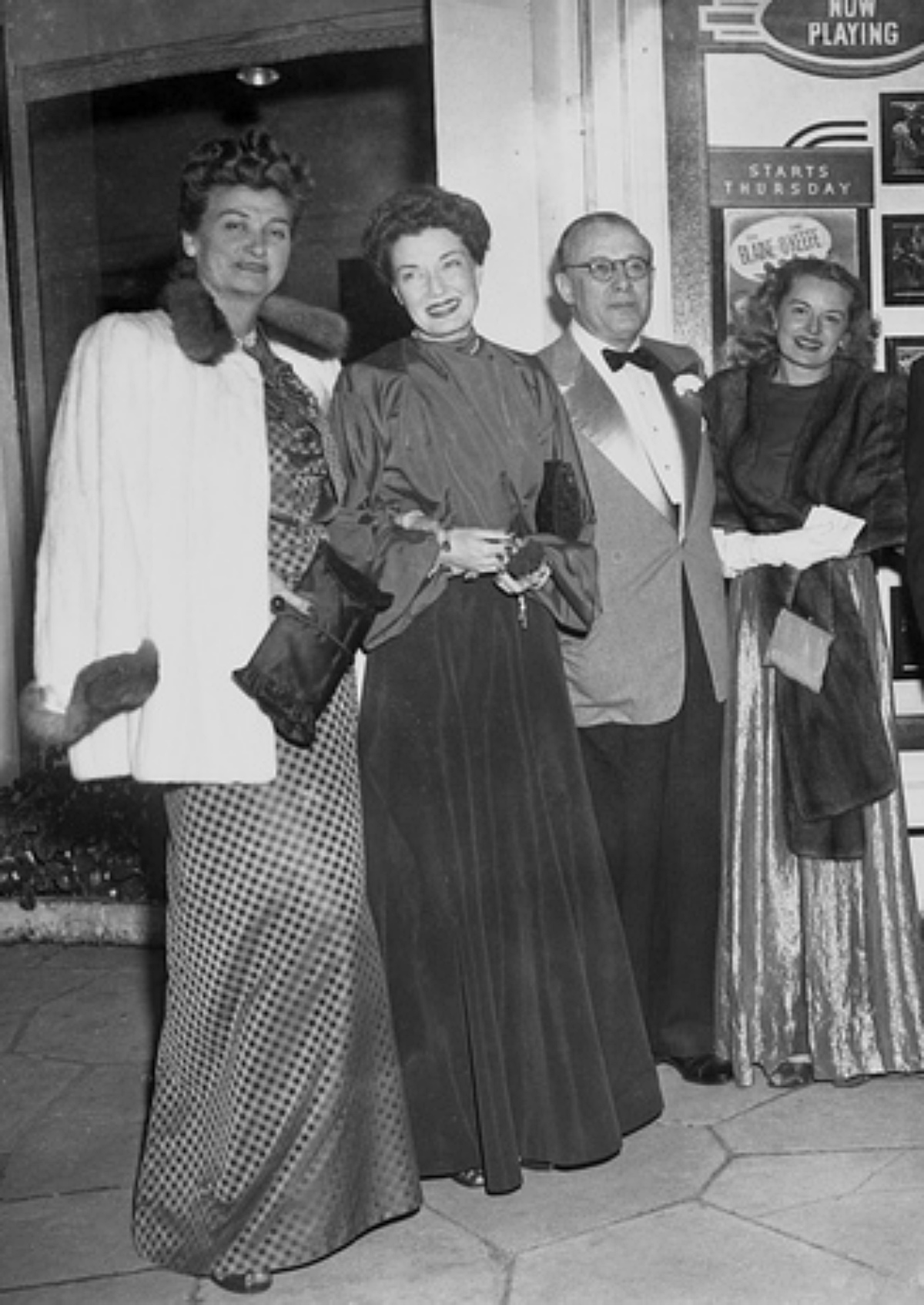 Countees Mon von Bismarck with friends at an evening event, 1943