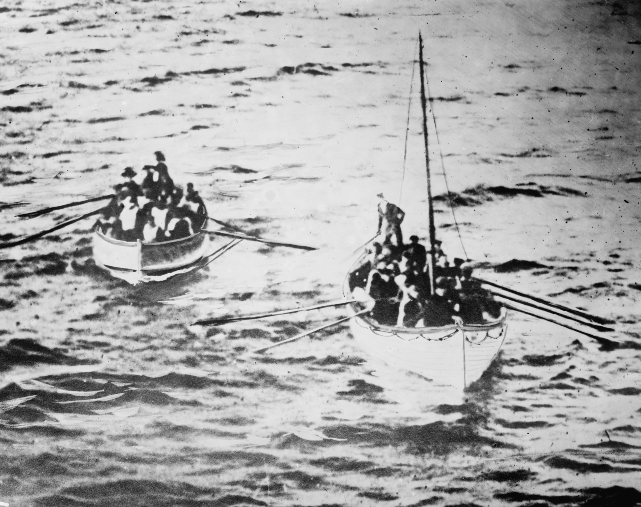 Titanic survivors on lifeboats as seen from the Carpathia