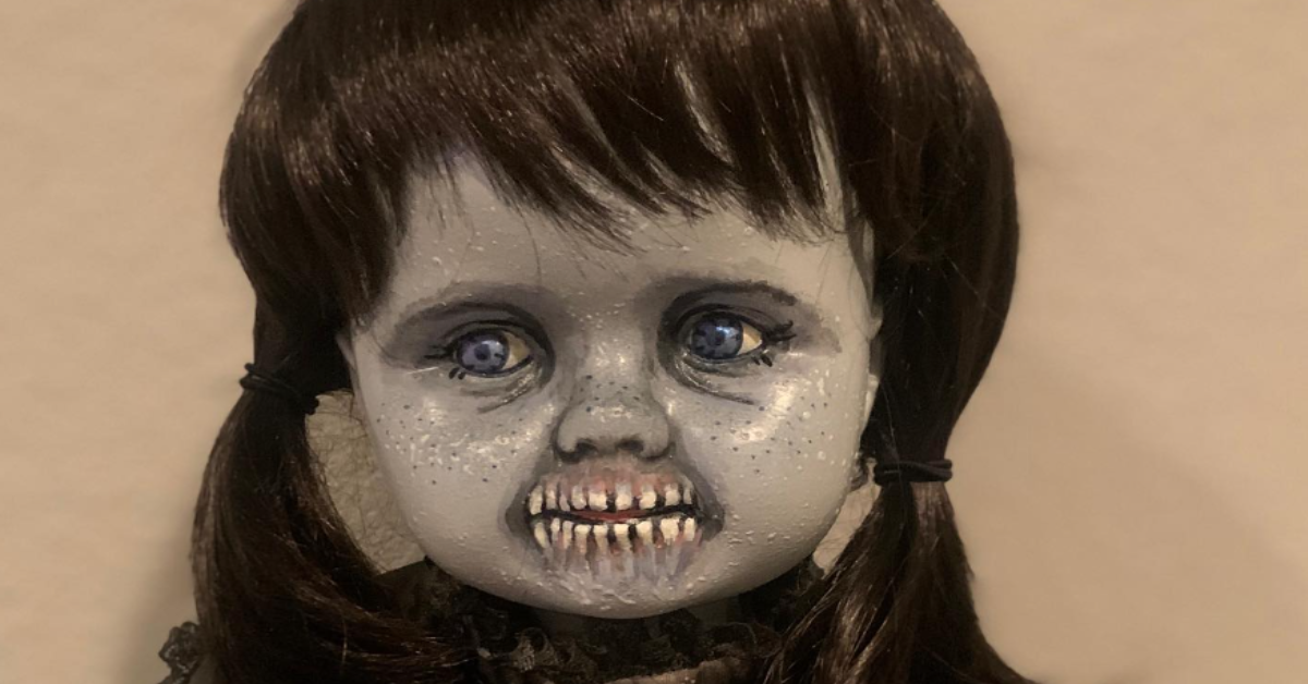 Creepy best sale antique doll