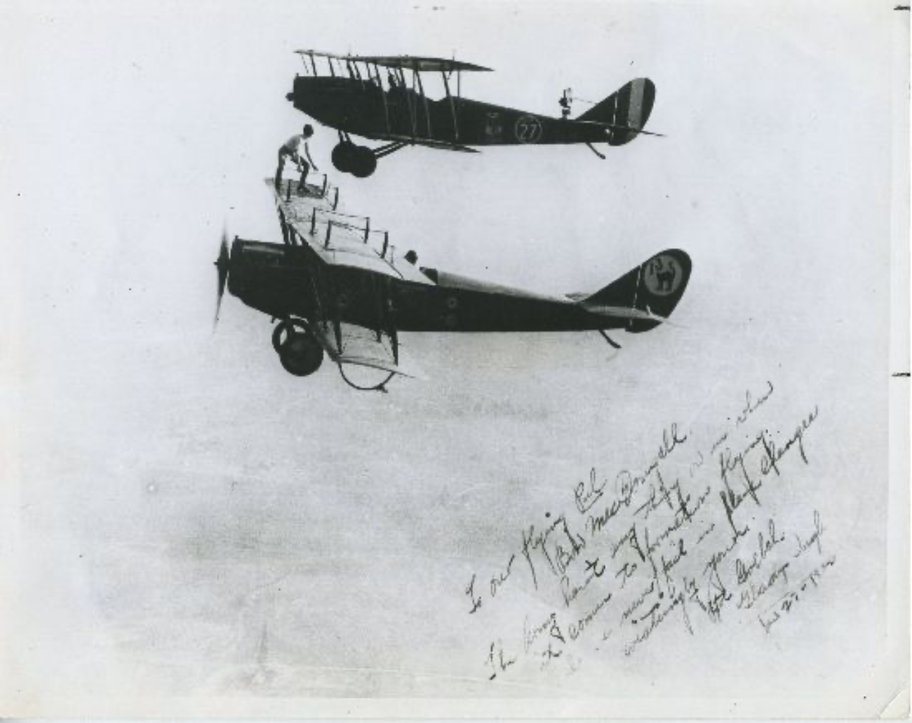 Gladys Ingle jumping between planes 1920s