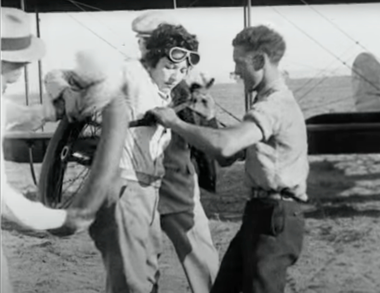 Gladys Ingle preparing to jump between planes 1920s