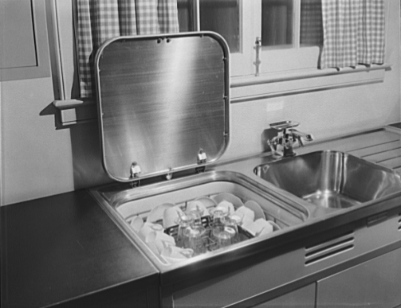 early dishwasher machine in kitchen