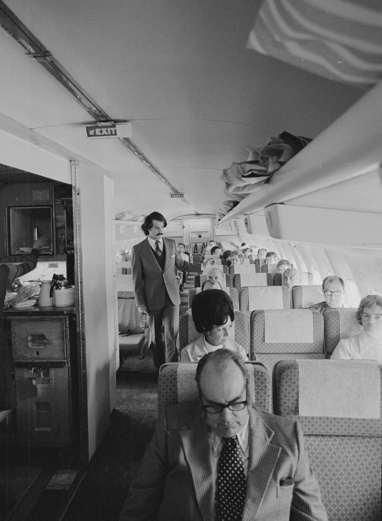 male flight attendant on a 1974 United Airlines flight
