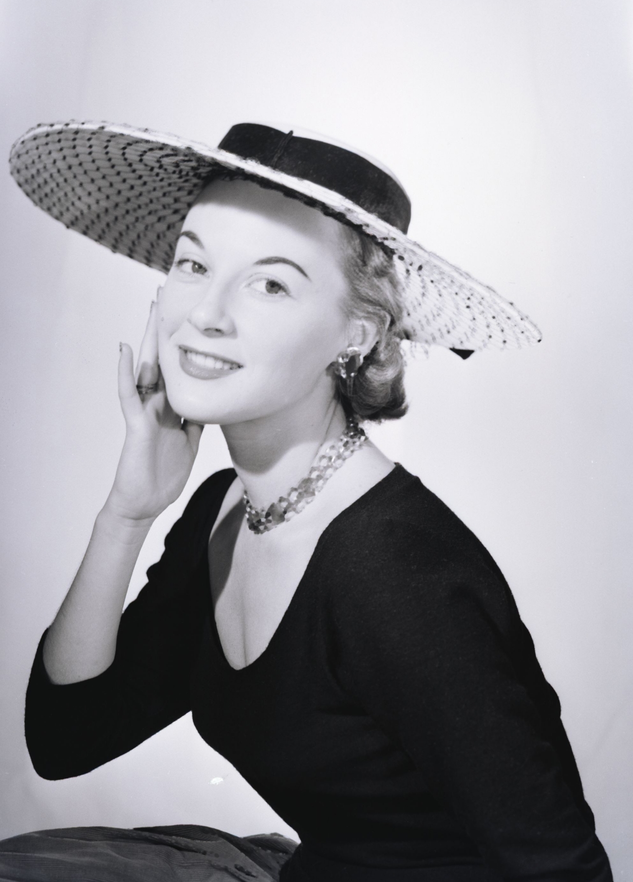 Woman in Hat Wearing a Choker 1950s