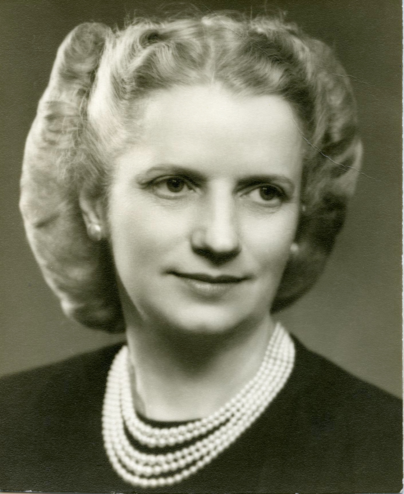 Woman in Multistrand Pearl Necklace