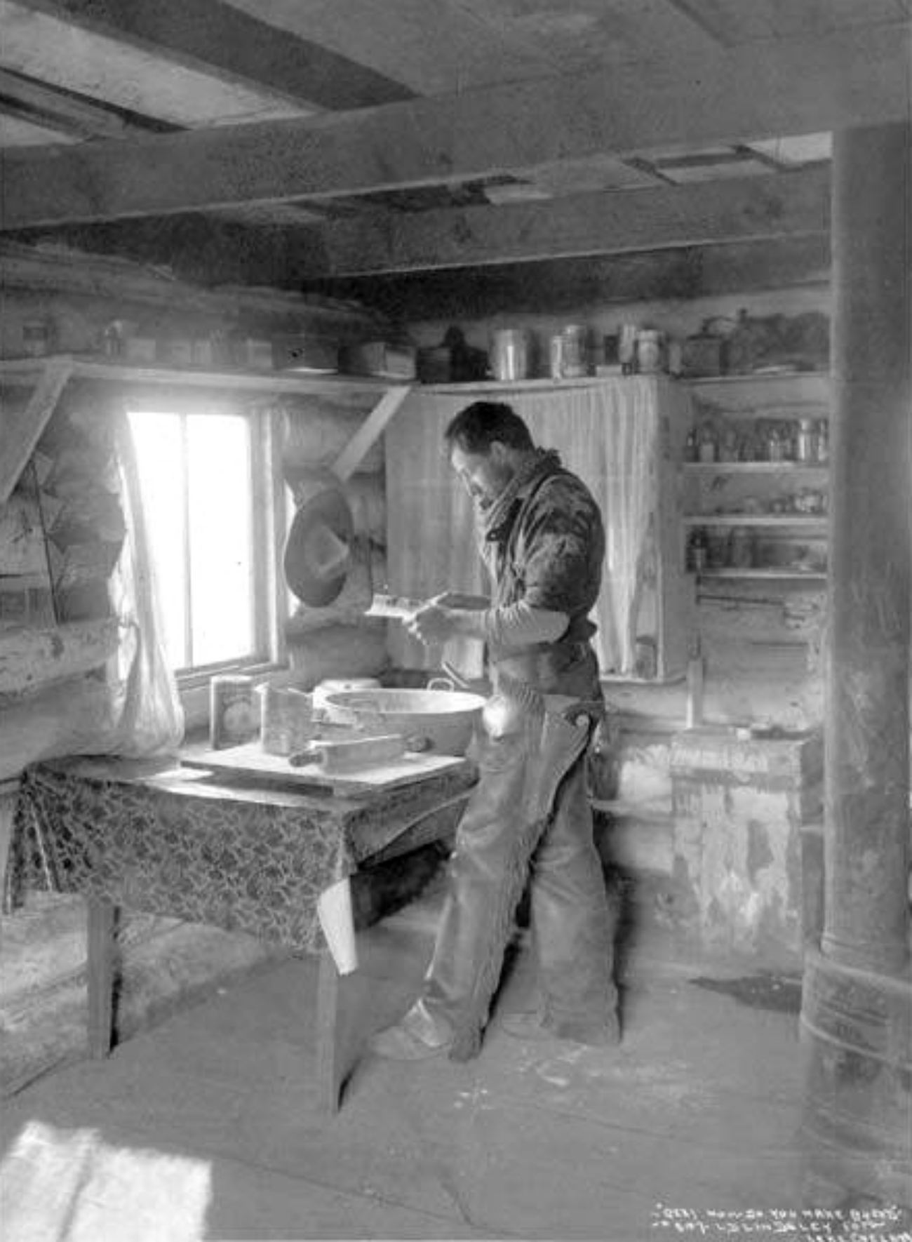 Making bread in a log cabin