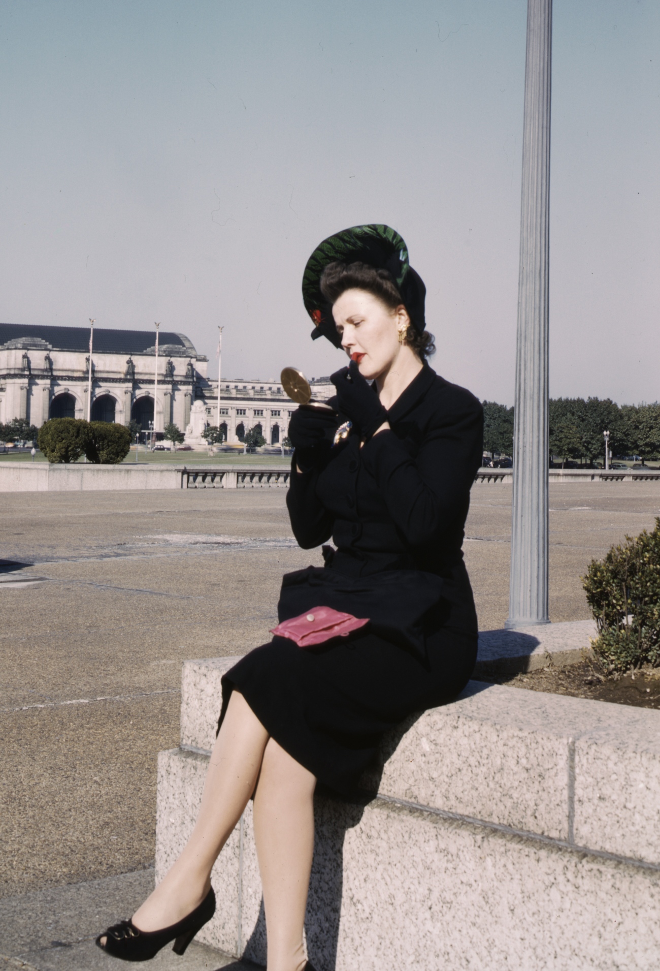 Woman Applying Lipstick in DC 1943