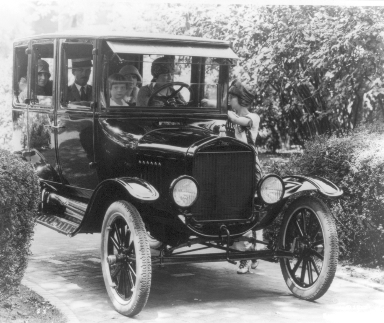 Woman Driving Her Family in Ford Car 1923