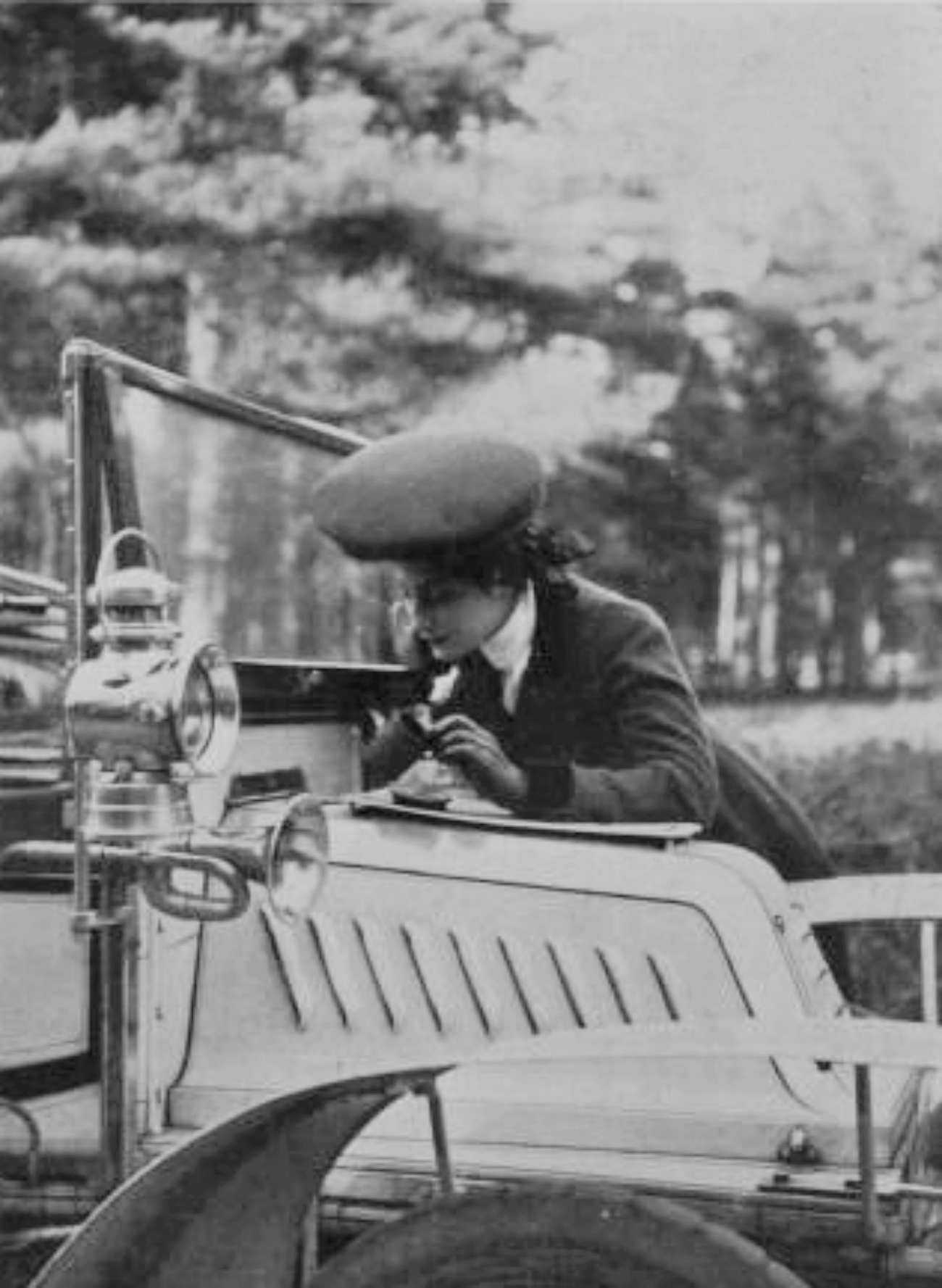 Dorothy Levitt Working on Car Engine