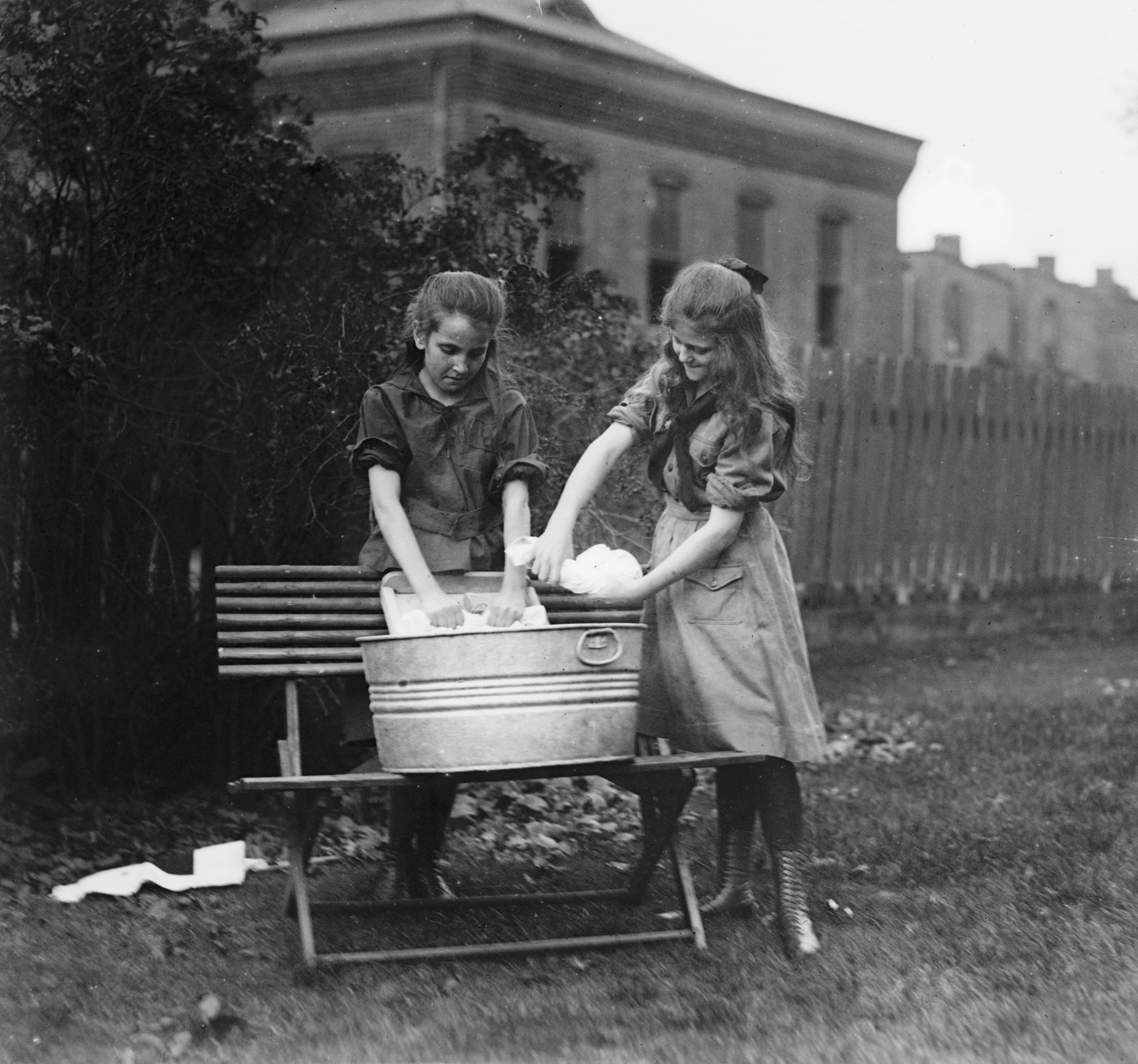 Girl Scouts doing Laundry by Hand