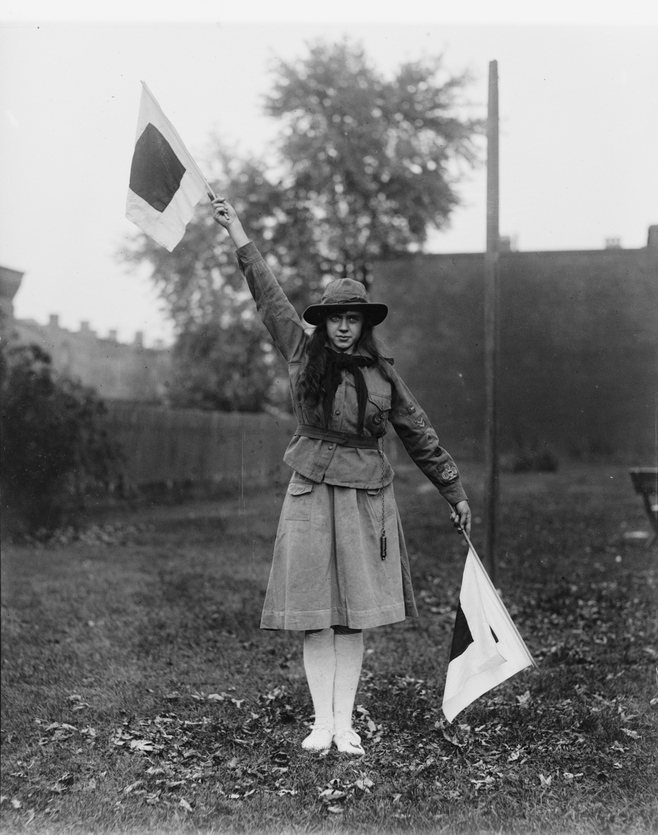 Girl Scout Using Signal Flags