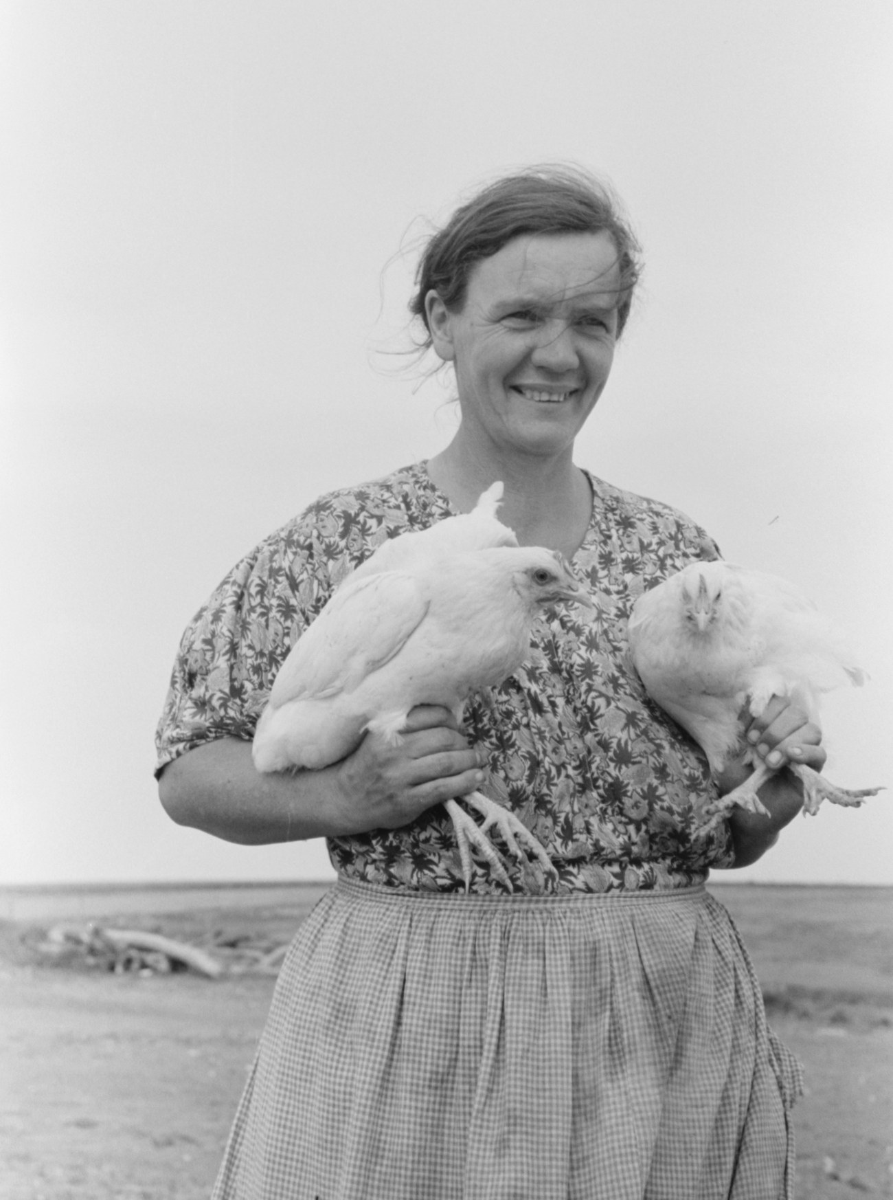 1930s Farmer Wife with Two Chickens