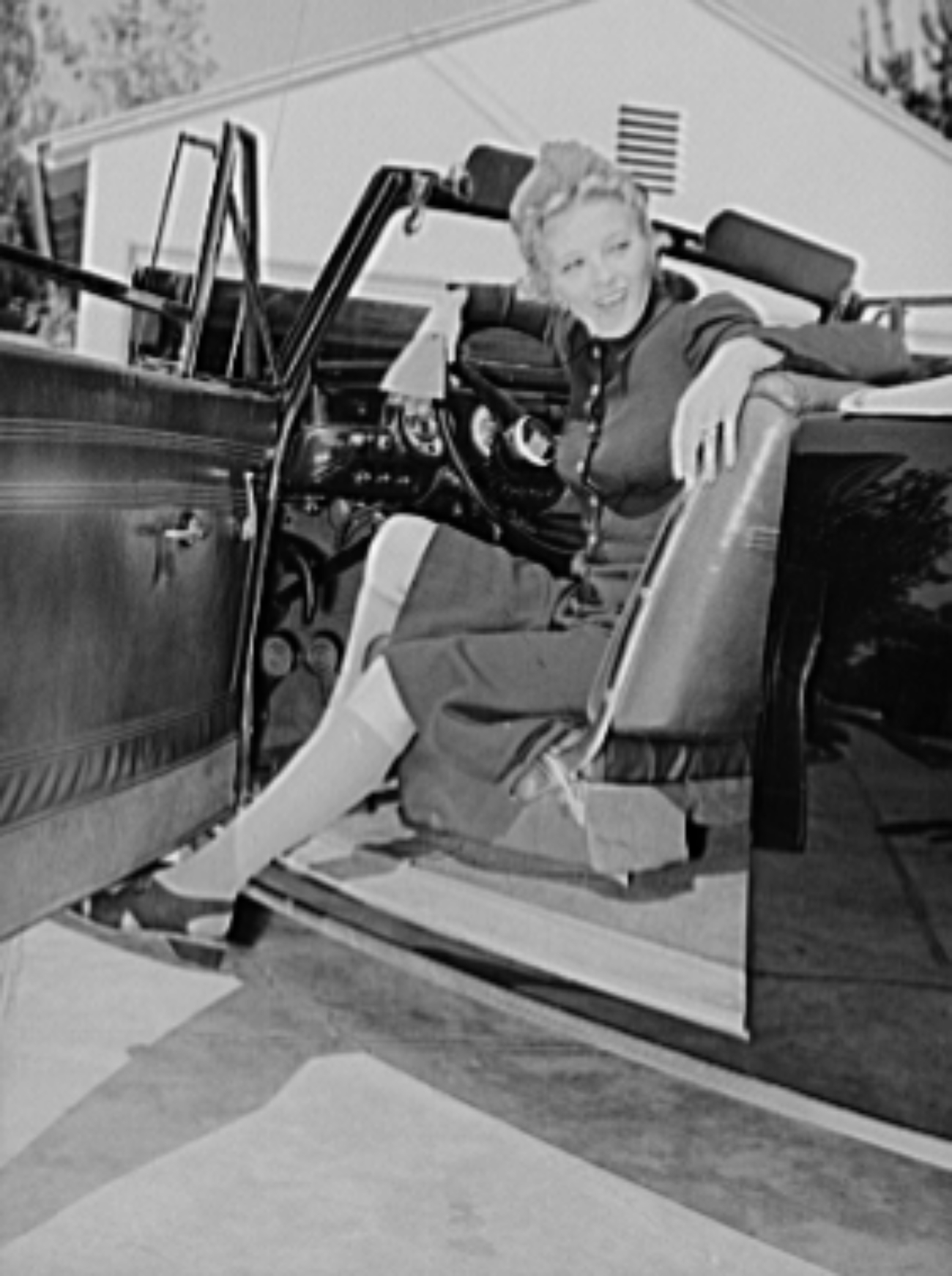  Ilona Massey modeling knit socks during WWII