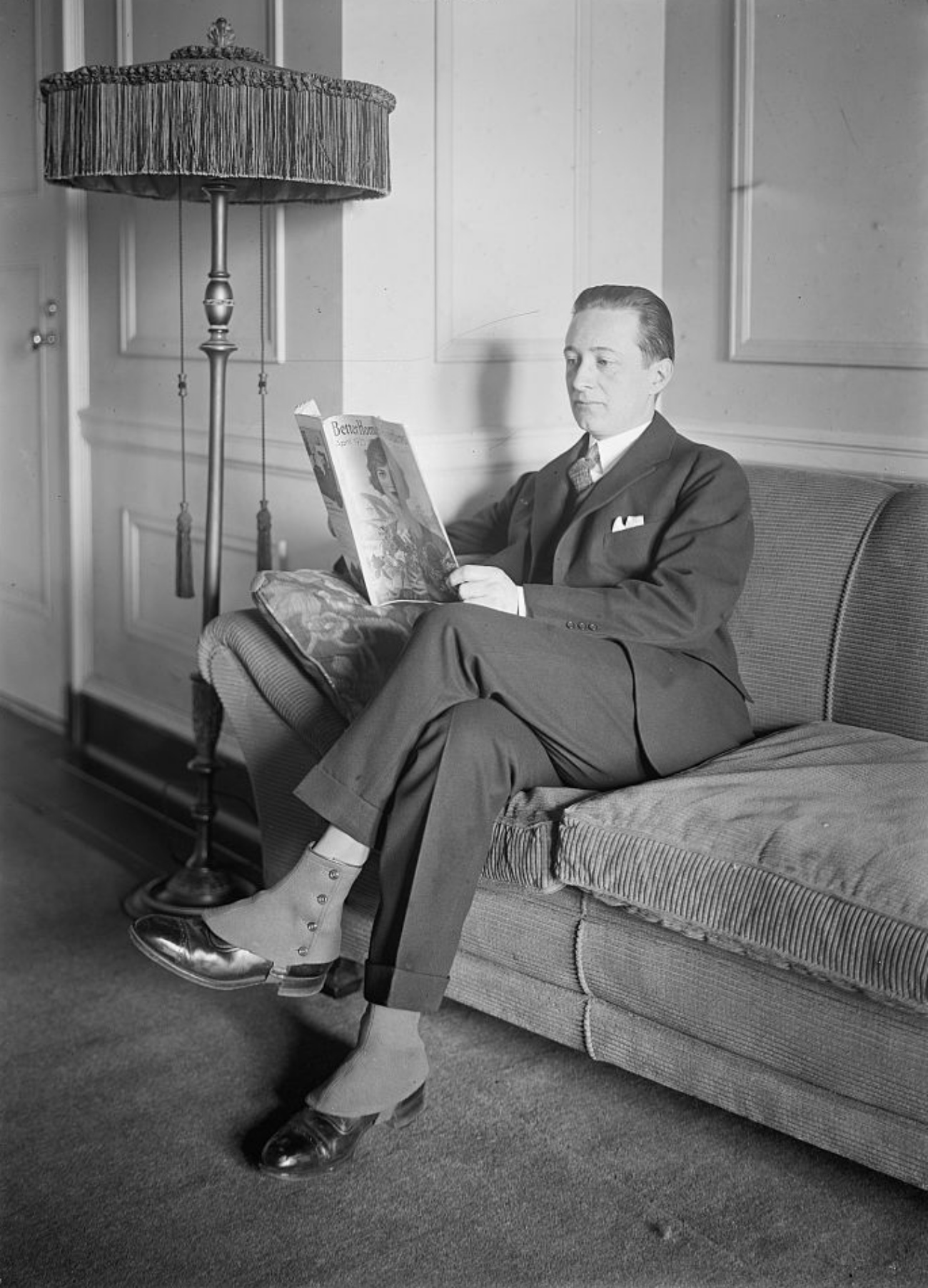Upper Class Man Reading a Newspaper and Wearing Spats