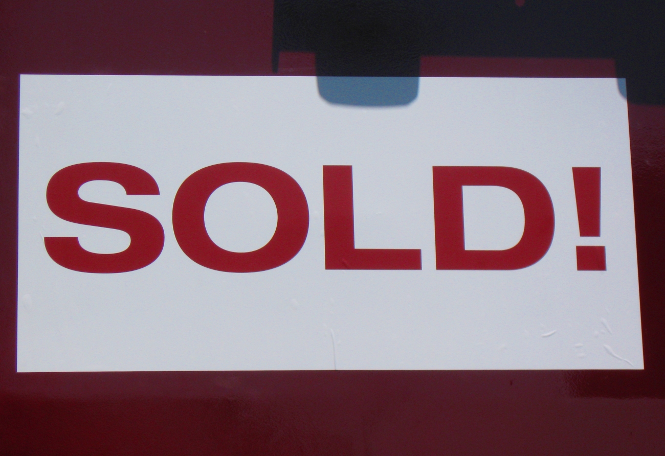 Sold Sign in Red and White