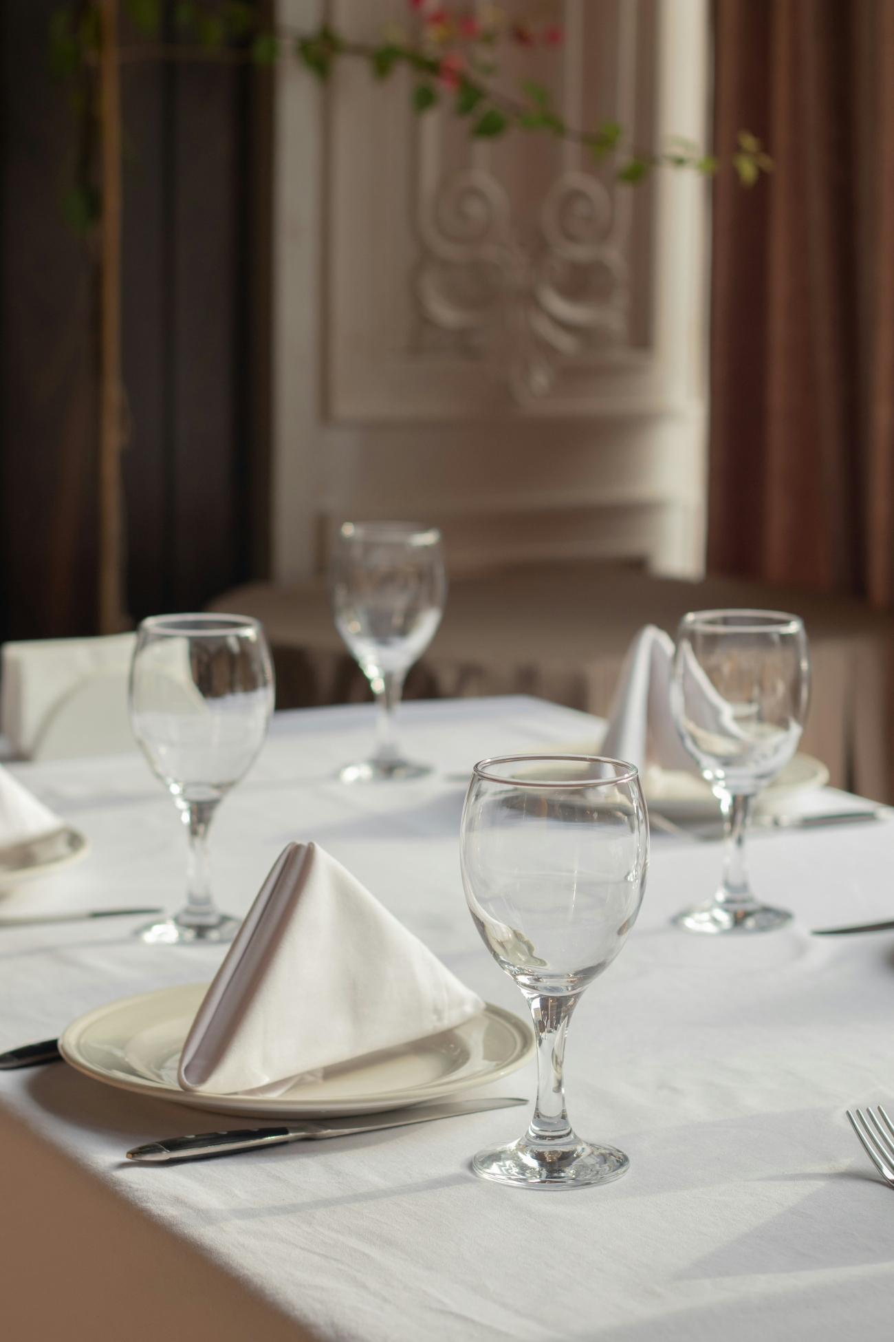 Table with Folded Triangle Cloth Napkins