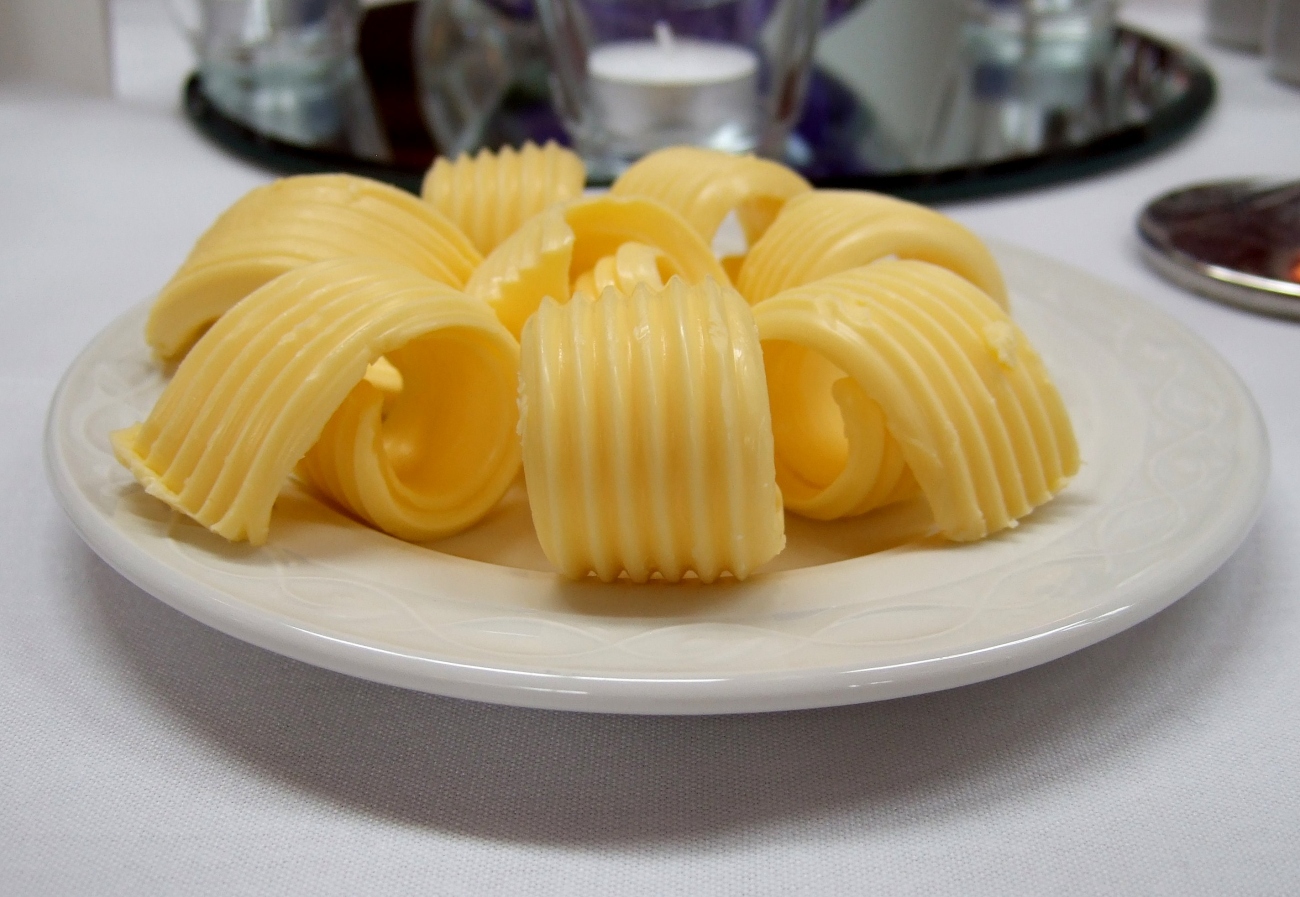 Curls of Butter at the Table