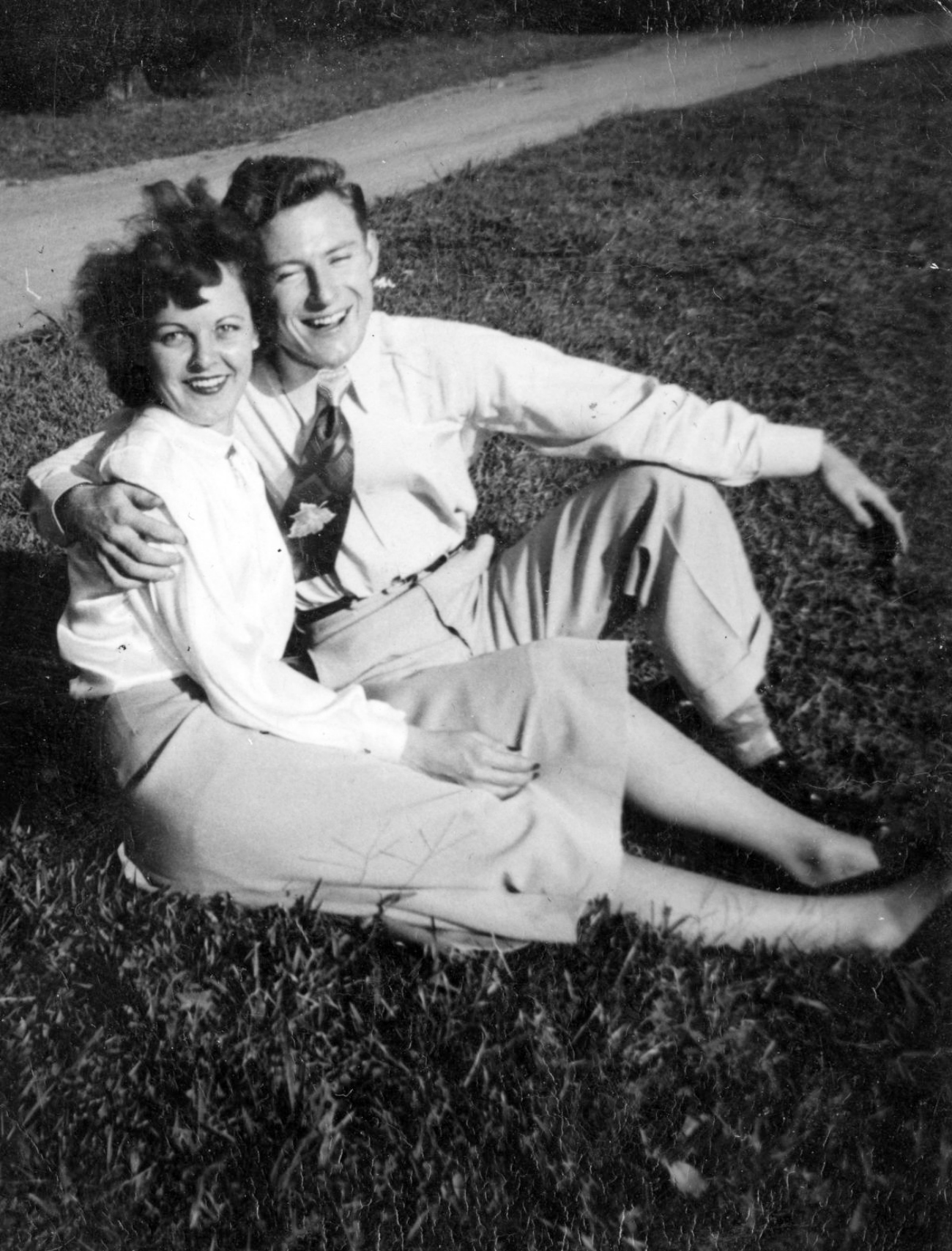 Couple Sitting in the Grass 1940s