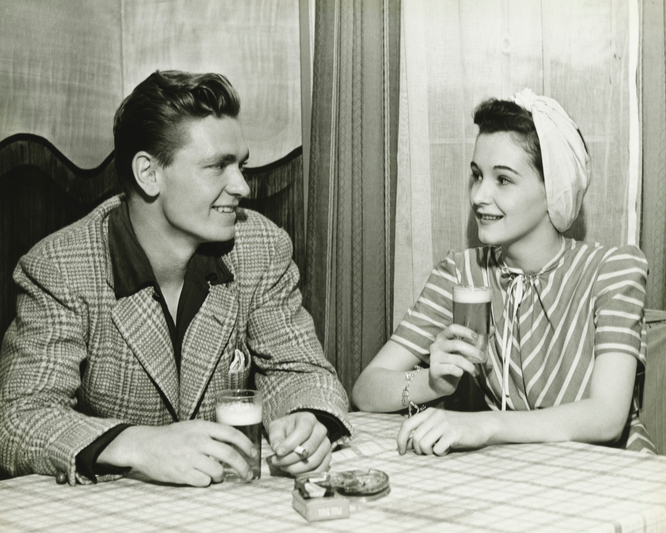 1940s Couple at a Beer Hall