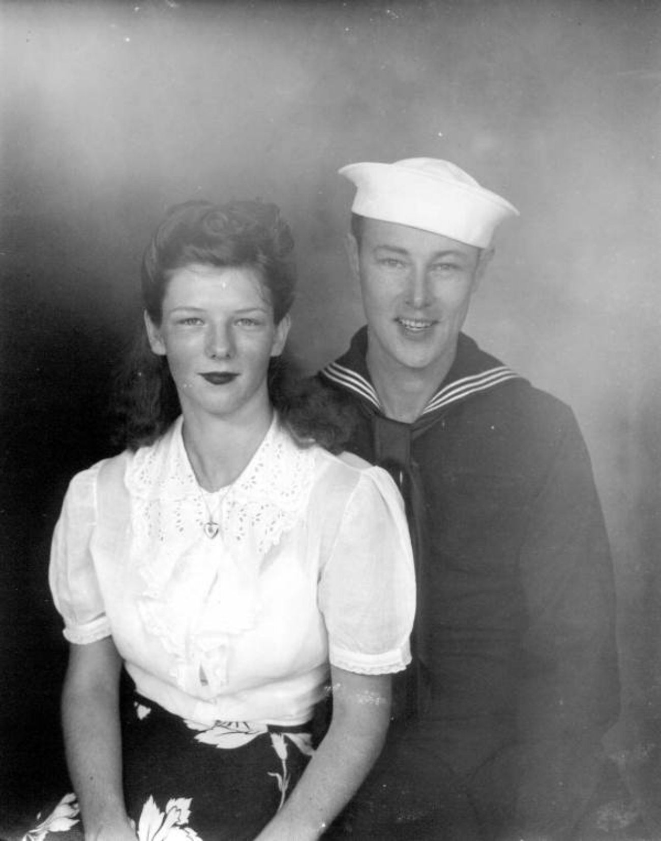 1942 Couple Portrait Many in Naval Uniform