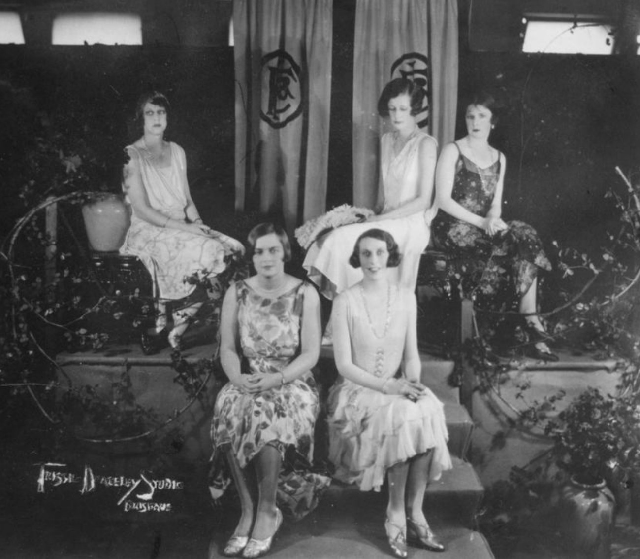 Group of 1920s Fashion Models Seated