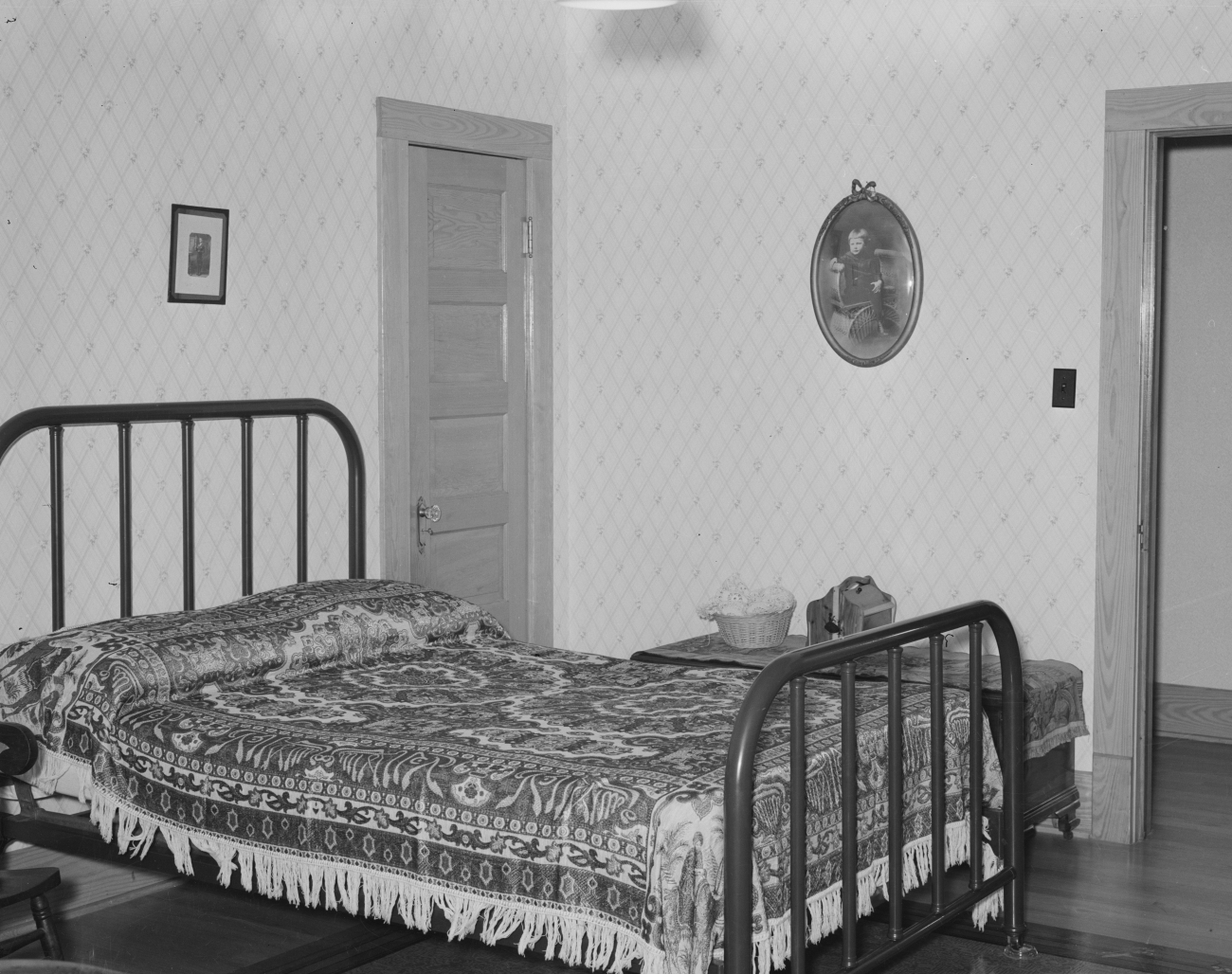 Metal Bed with Tapestry Bedspread