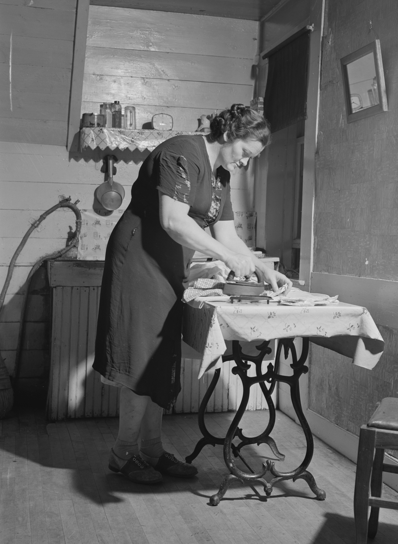 Woman Using Old Fashioned Iron 1940s