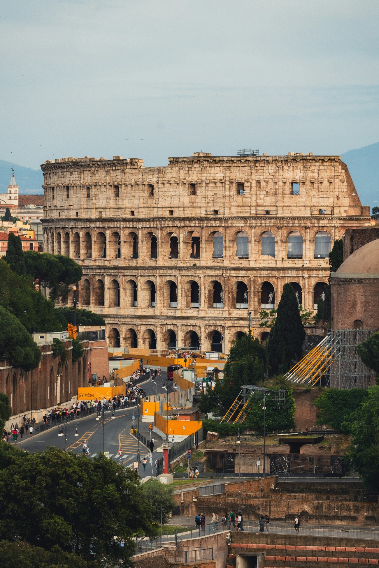 Colosseum in Rome Surrounded by Buildings