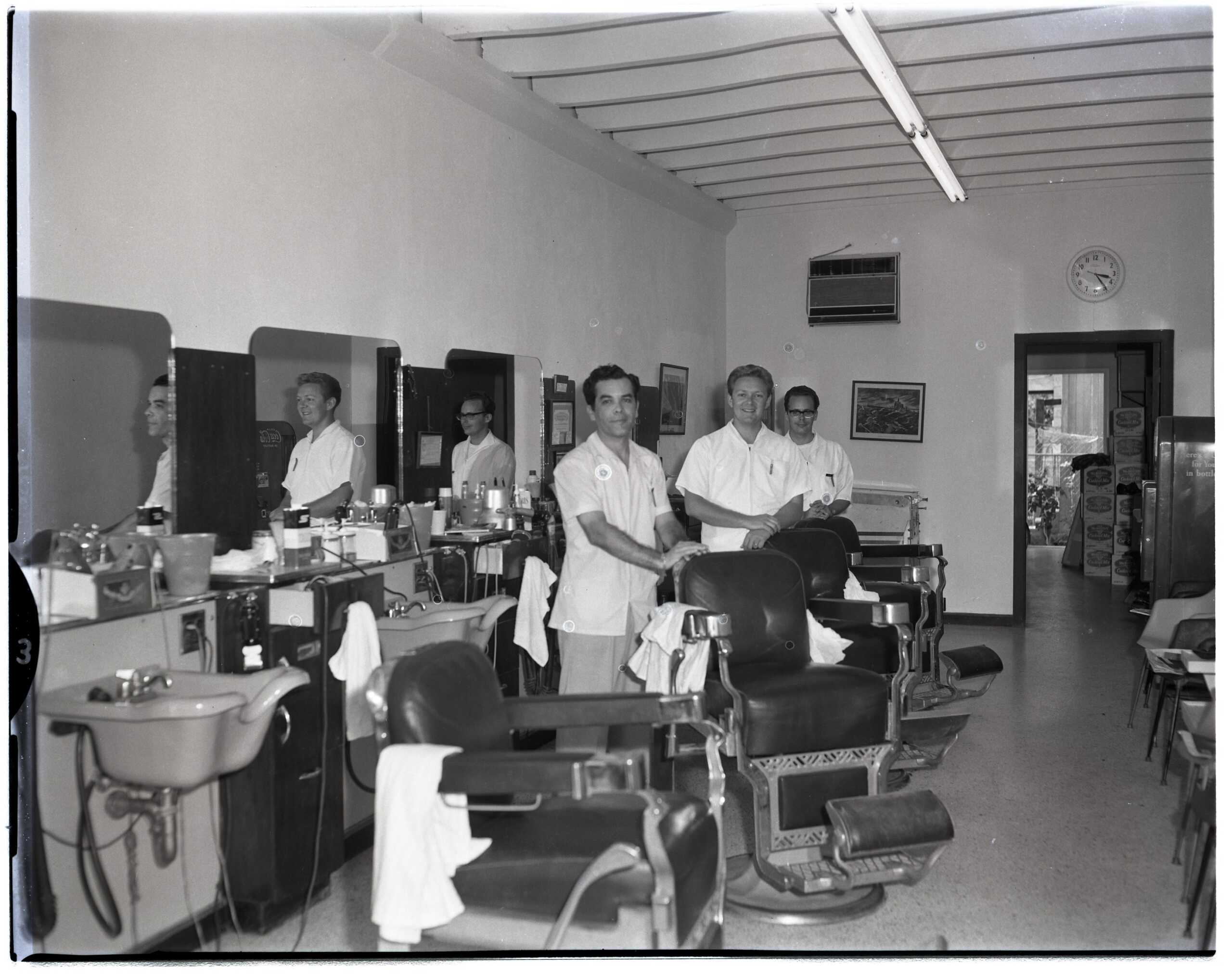 A bustling barber shop with vintage decor, barbers cutting hair, and customers enjoying their grooming experience.