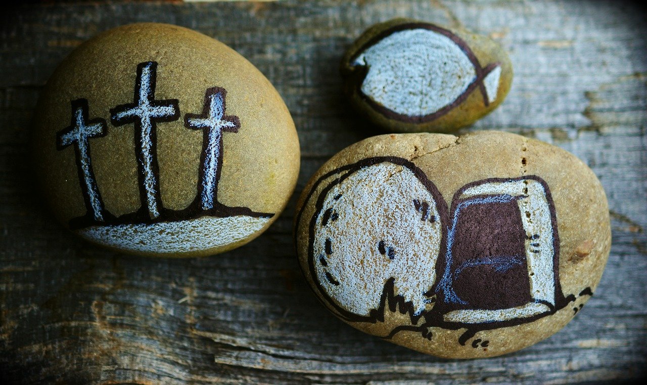 stones with crosses painted on them