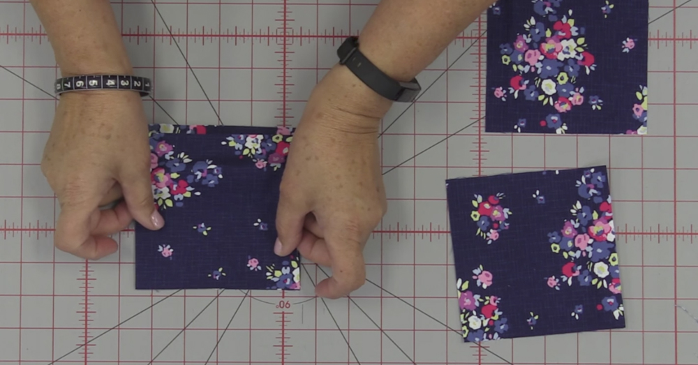 Jenny Lines Up 2 Charms And Cuts Them In Half For This Stunning Quilt ...