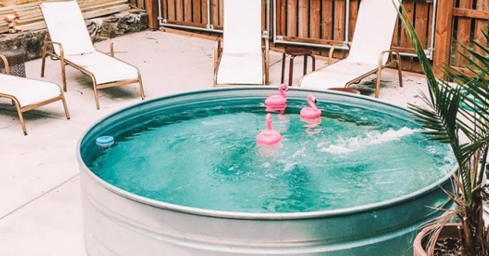 Stock Tank Swimming Pools Are An Easy (And Trendy) Way To Beat The Heat