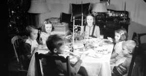 children having Christmas dinner, 1938