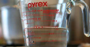 measuring cup filled with vinegar